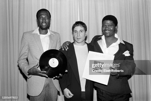 Albert Mazibuko, Paul Simon and Joseph Shabalala at a news conference announcing the release of Simon's 'Graceland' album in New York City on August...