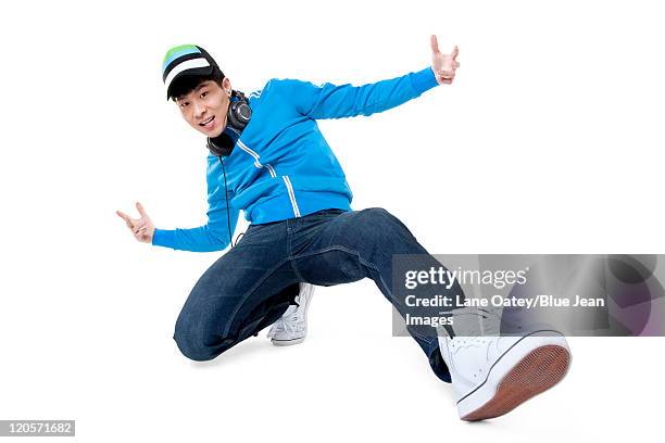 portrait of a man breakdancing - kneeling man front stock pictures, royalty-free photos & images