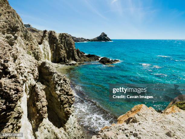 reef of sirenas in cabo de gata, almeria, spain - paisaje volcánico - fotografias e filmes do acervo