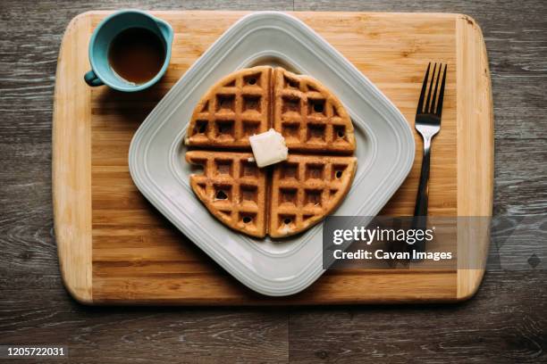 high angle view of waffle on a table - stroopwafel stockfoto's en -beelden