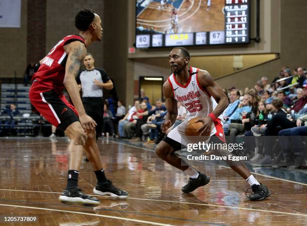 Marquis Teague of the Memphis Hustle looks to drive against the Sioux Falls Skyforce at the Sanford Pentagon on March 7, 2020 in Sioux Falls, South...