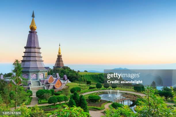 landscape of two pagoda on the top of inthanon mountain, tourist attraction in chiang mai, thailand - pagoda stock pictures, royalty-free photos & images