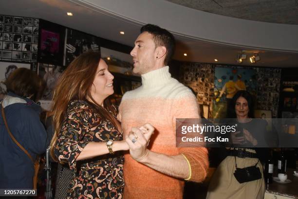 Maxime Dereymez from « Danse Avec Les Stars » and a guest attend the "Apero Catalan" Hosted by Technikart And Grand Seigneur Magazines At Cafe Renoma...