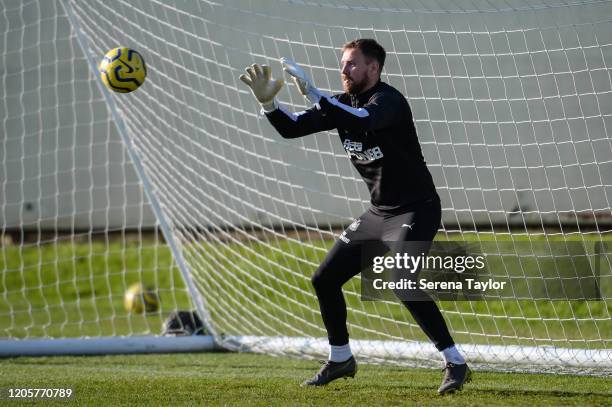 Goalkeeper Rob Elliot sets to catch the ball during the Newcastle United Training Session at the Newcastle United Training Centre on February 12,...