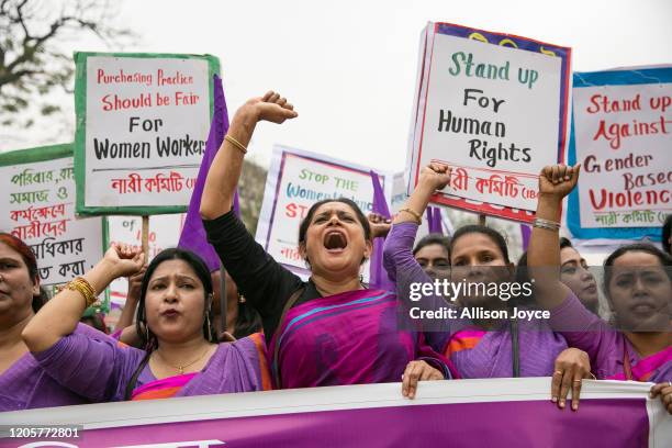 Women attend a Women's Day rally March 8, 2020 in Dhaka, Bangladesh. International Women's Day is observed on March 8 every year, celebrating the...