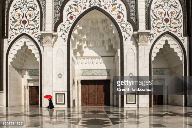 the main enterance of federal territory mosque, kuala lumpur - kuala lumpur stock pictures, royalty-free photos & images