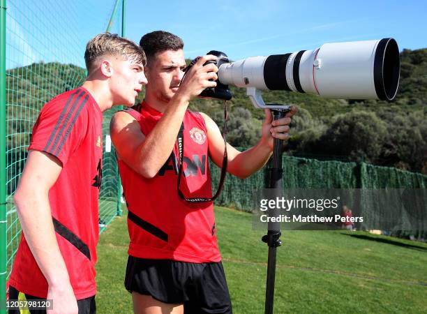 Diogo Dalot of Manchester United takes a photo during a first team training session on February 12, 2020 in Malaga, Spain.