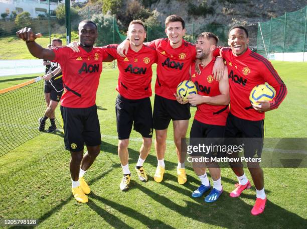 Eric Bailly, Nemanja Matic, Harry Maguire, Luke Shaw and Anthony Martial of Manchester United in action during a first team training session on...
