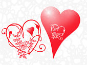 In love two red hearts on a white background