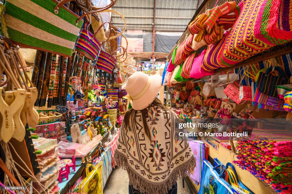 Tourist shopping for souvenirs at the Hidalgo market in Guanajuato, Mexico