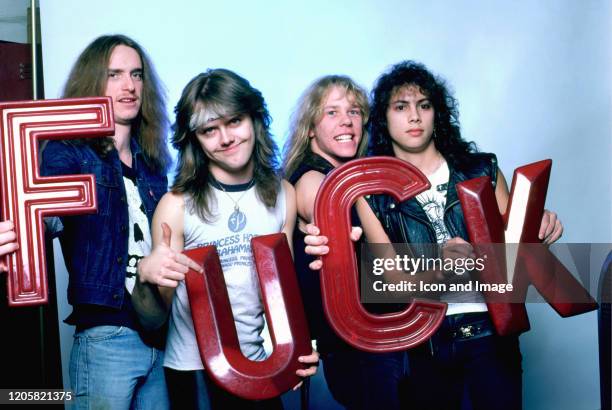 Bass guitarist Cliff Burton , drummer Lars Ulrich, vocals, guitarist James Hetfield and guitarist Kirk Hammett pose for a studio portrait during the...