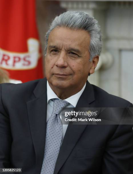 President of the Republic of Ecuador Lenín Moreno listens to U.S. President Donald Trump speak, during a meeting in the Oval Office at the White...