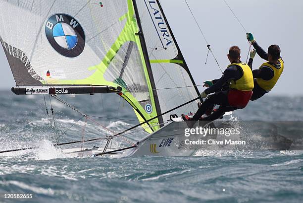 Tobias Schadewalt and Hannes Baumann of Germany in action during a 49er Class race during day six of the Weymouth and Portland International Regatta...