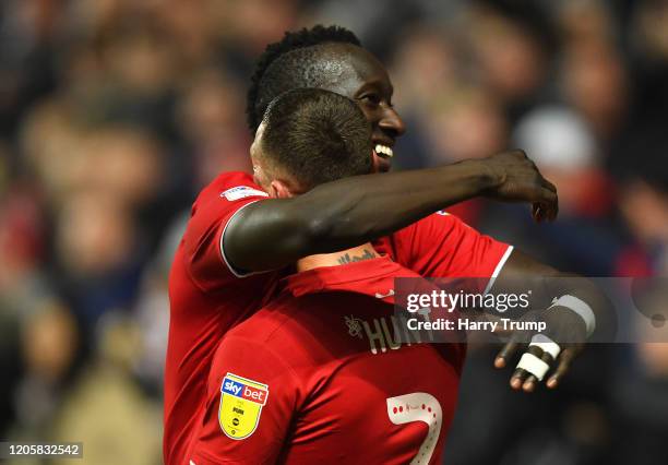 Famara Diedhiou of Bristol City celebrates after scoring his sides third goal with Jack Hunt of Bristol City during the Sky Bet Championship match...