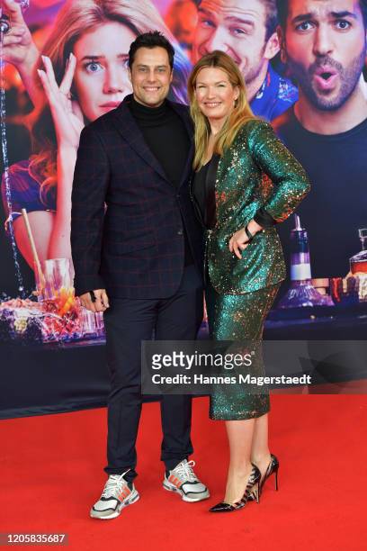 Roman Libbertz and his wife Jessica Libbertz attend the premiere of "Nightlife" at Mathaeser Filmpalast on February 12, 2020 in Munich, Germany.