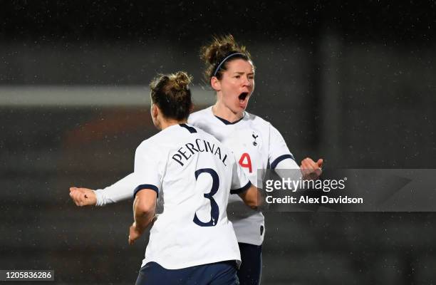 Emma Mitchell of Tottenham celebrates with Ria Percival after scoring her sides second goal during the Barclays FA Women's Super League match between...