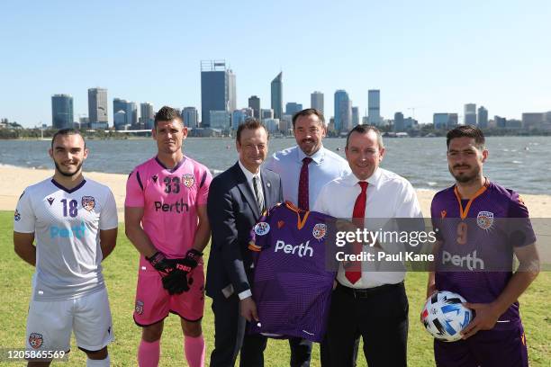 Perth Glory CEO Tony Pignata presents West Australian Premier Mark McGowan an AFC Champions League shirt during a Perth Glory media opportunity at...