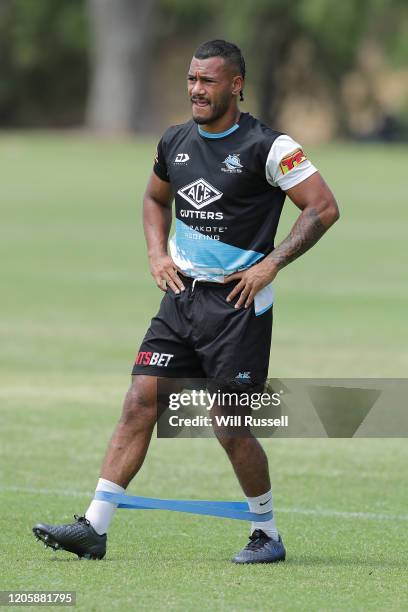 Sione Katoa of the Sharks stretches during the Cronulla Sharks NRL training session at UWA Sports Park on February 13, 2020 in Perth, Australia.