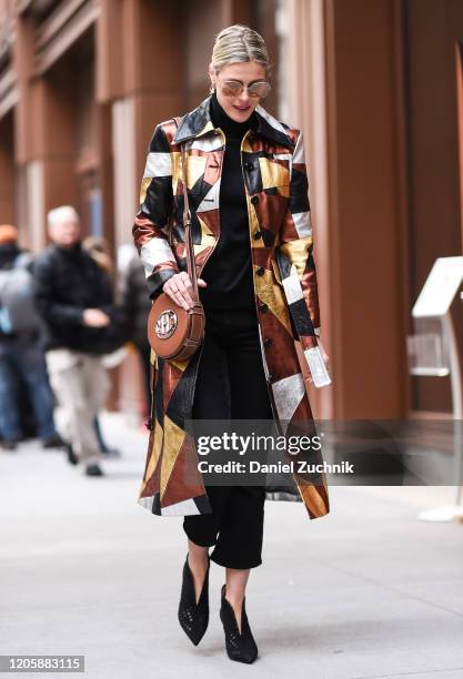 Sofie Valkiers is seen wearing a Michael Kors coat and bag outside the Michael Kors show during New York Fashion Week: A/W20 on February 12, 2020 in...