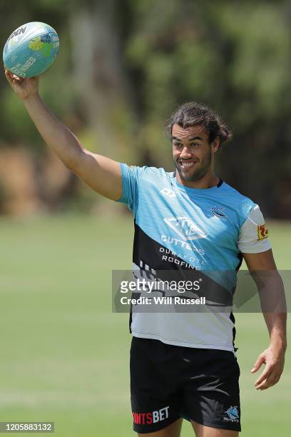 Toby Rudolf of the Sharks looks to pass the ball during the Cronulla Sharks NRL training session at UWA Sports Park on February 13, 2020 in Perth,...
