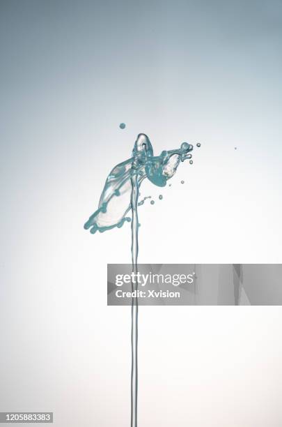 water splashing captured in high speed - slow motion water stock pictures, royalty-free photos & images