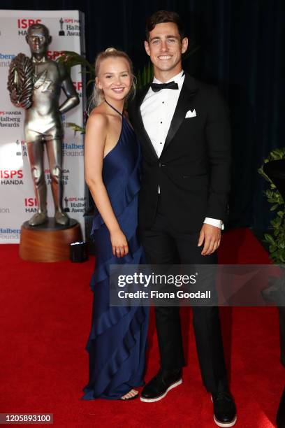 Liam Malone and partner Ella Jones arrive on the red carpet at the Halberg Awards at Spark Arena on February 13, 2020 in Auckland, New Zealand.