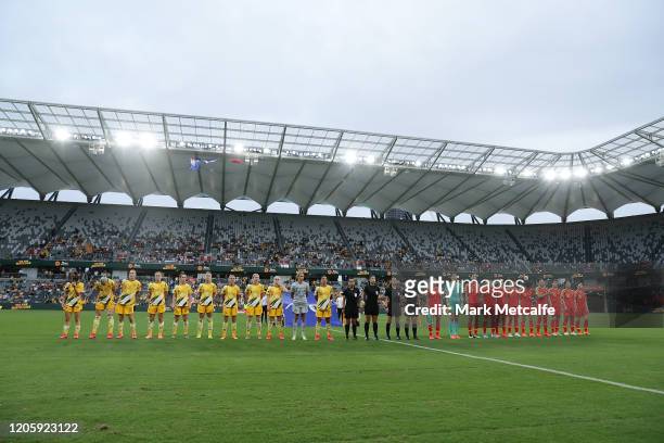 The Matildas and China PR line up for the national anthems during the Women's Olympic Football Tournament Qualifier between Australia and China PR at...