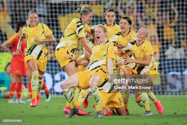 Emily van Egmond of the Matildas celebrates her goal with team mates during the Women's Olympic Football Tournament Qualifier between Australia and...
