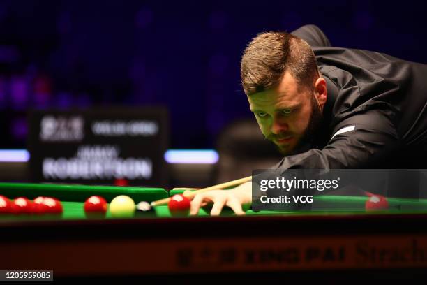 Jimmy Robertson of England plays a shot during the 3rd round match against Ding Junhui of China on day four of the 2020 ManBetX Welsh Open at the...