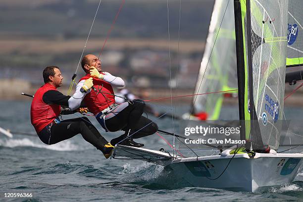 Iker Martinez de Lizarduy and Xabier Fernandez Gaztanaga of Spain in action during a 49er Class race during day six of the Weymouth and Portland...