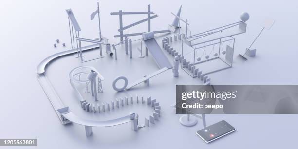 zelfgemaakte complexe over-engineered machine om mobiele telefoon te beantwoorden - geval stockfoto's en -beelden