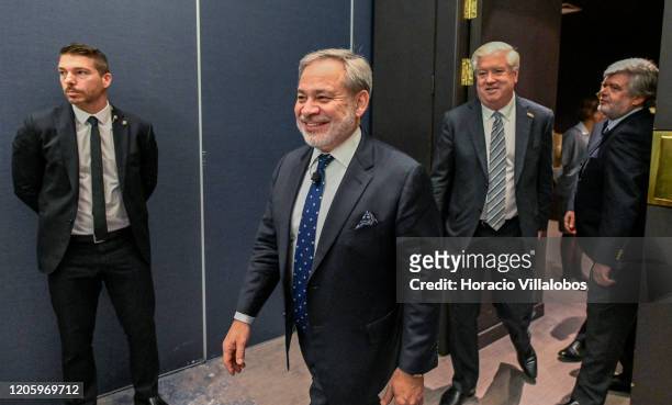 Ambassador to Portugal, George Edward Glass foloows US Secretary of Energy, Dan Brouillette, as they arrive to hold a meeting with 17 business...