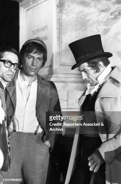 Italian actors Nino Manfredi and Enrico Maria Salerno and Italian director Luigi Magni together on the set of the film The Conspirators. 1969