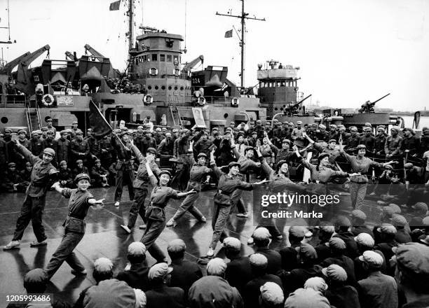 Workers and red guards participating in the theatrical performance of workers. Peasants and soldiers. The festival of shanghai. The great proletarian...