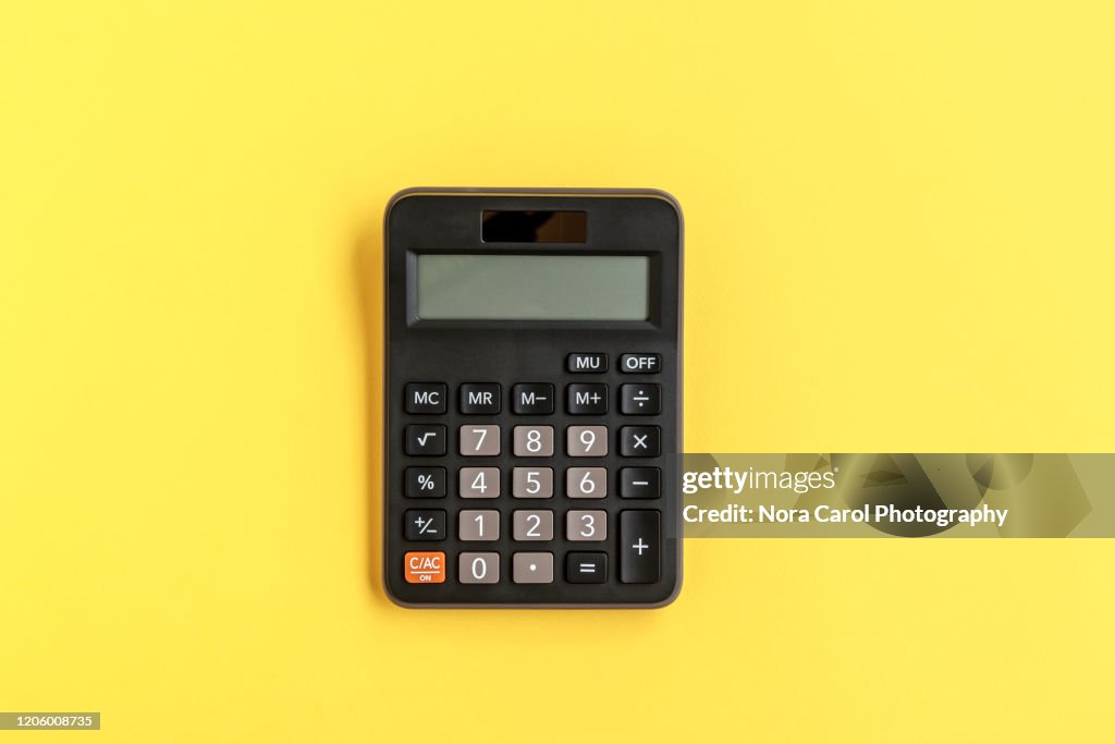 Calculator on Yellow background