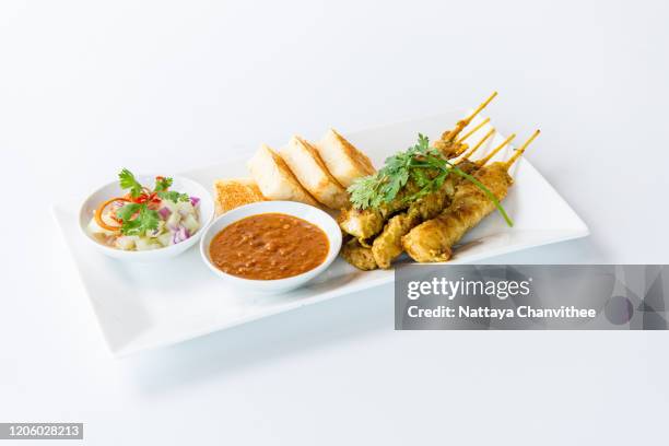 chicken satay with peanut sauce - stock photo - curry powder stock pictures, royalty-free photos & images