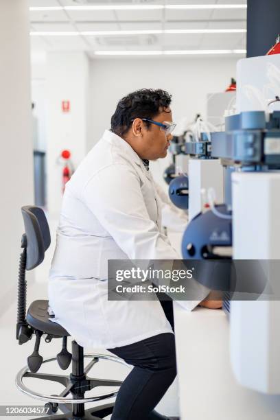 Identification Diagnostic Scientist In A Working Lab High-Res Stock ...