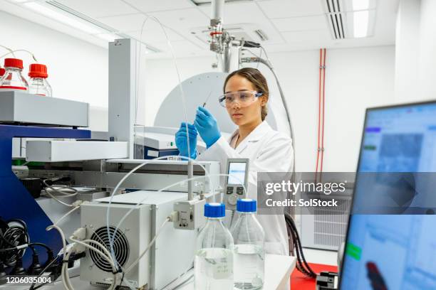 biomarker discovery is her expertise - medical technical equipment stock pictures, royalty-free photos & images