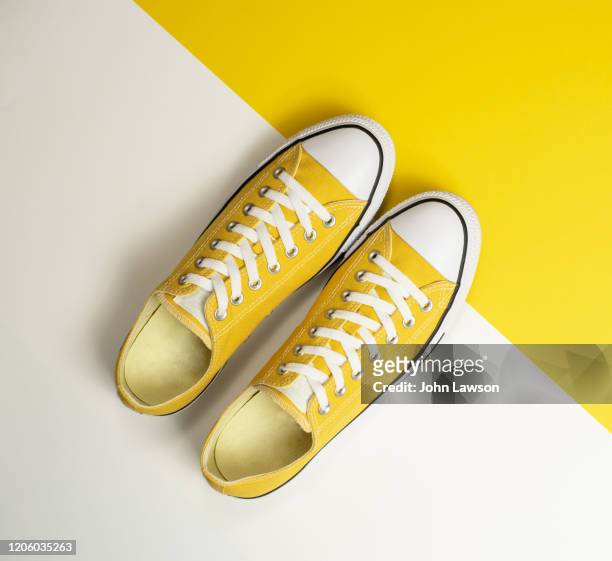 yellow sneakers - comfortable shoes stock pictures, royalty-free photos & images