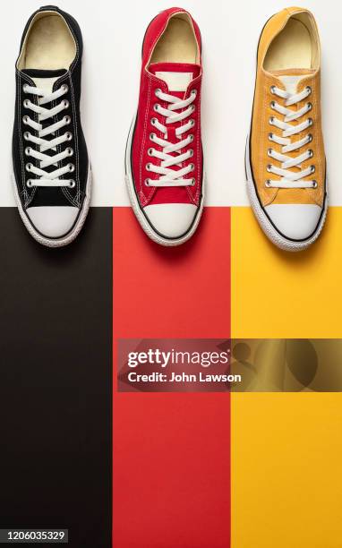 german flag sneakers - german flag wallpaper stock pictures, royalty-free photos & images