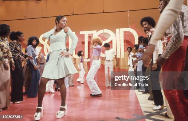 Soul Train dancers boogie down the Soul Train Line in episode 69, aired 9/8/1973. Popular dancer Derek Bennett - aka Miss Derek - is in the lavender...