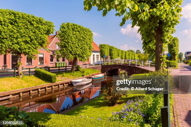 canal in ijlst friesland netherlands - friesland netherlands stock pictures, royalty-free photos & images