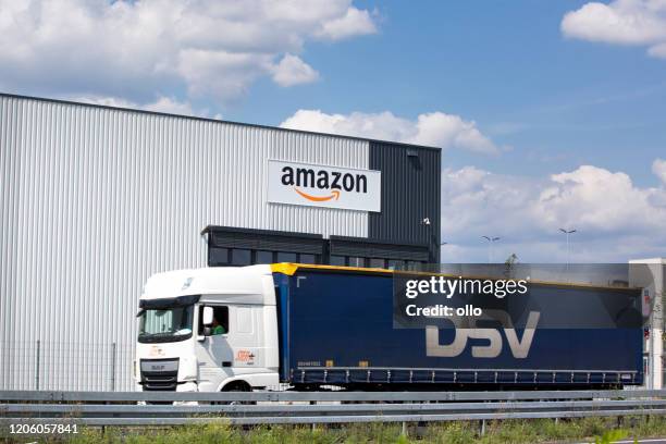 logistics center of amazon in raunheim-moenchhof, germany - amazon warehouse stock pictures, royalty-free photos & images