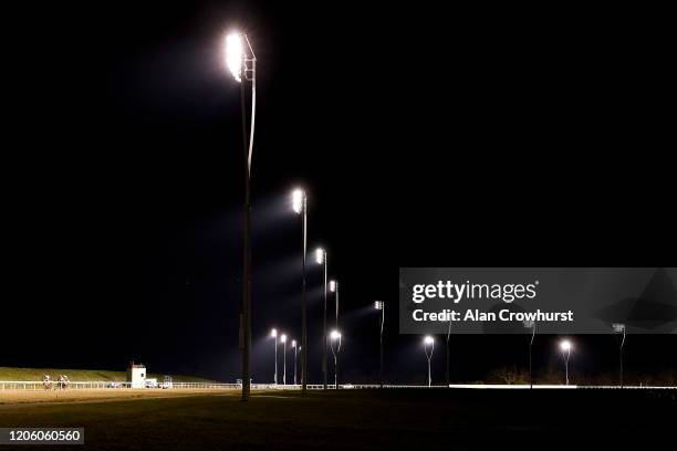 General view as runners race down the back straight in The May Bank Holiday Family Fun Day Handicap at Chelmsford City Racecourse on February 13,...