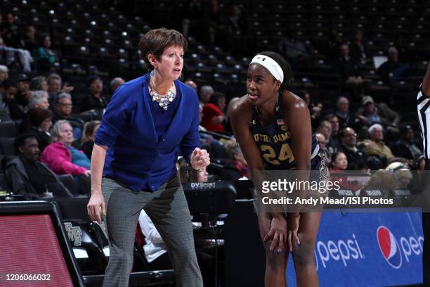Head coach Muffet McGraw of the University of Notre Dame talks with Destinee Walker during a game between Notre Dame and Wake Forest at Lawrence Joel...