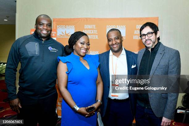 Frank Walrond, Margarette Purvis, Andre Thompson and Javier Ramirez Baron attend the 29th Annual Conference on hunger and poverty hosted by the Food...