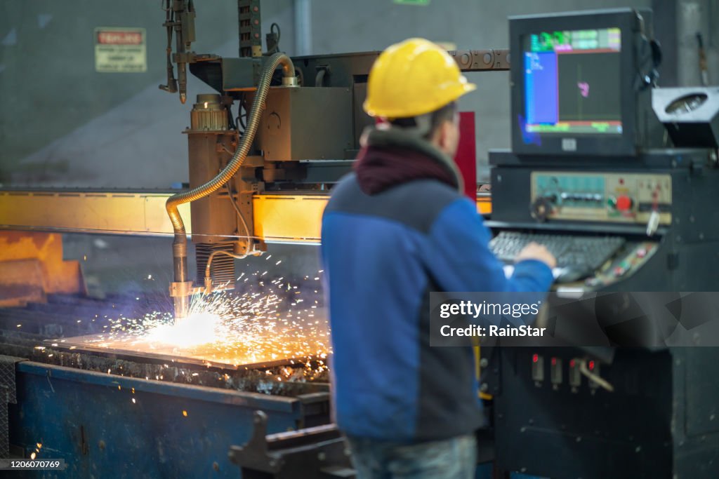 Portrait of an employee working on the production line
