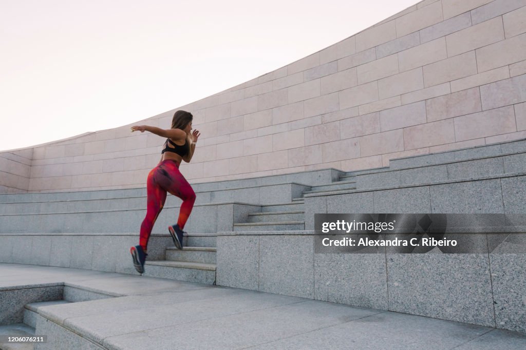 Running In Steps Woman Running Up Steps High-Res Stock Photo - Getty Images