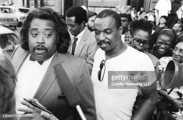 Rev. Al Sharpton with Moses Stewart outside Kings County Criminal Court in Brooklyn, New York on September 6, 1989. The pair were at court for the...