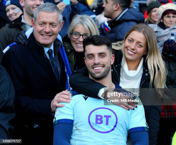 Adam Hastings celebrates with his partner, mother and his dad, the legendary Gavin Hastings, during the 2020 Guinness Six Nations match between...